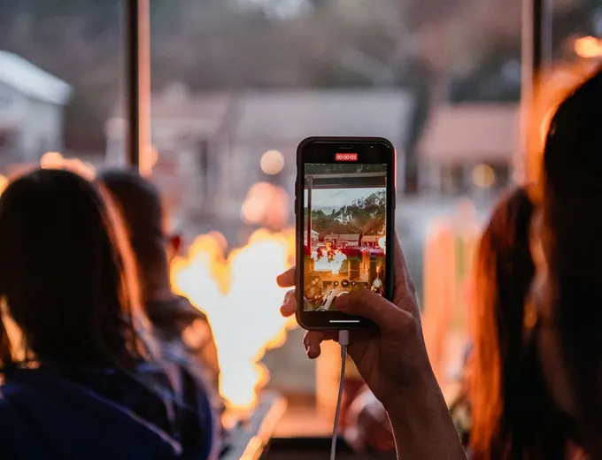 Someone recording on their phone